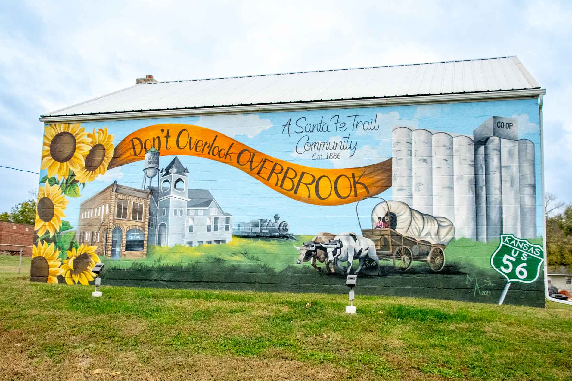 Mural on side of building that says "Don't Overlook Overbrook - A Santa Fe Trail Community Est 1886"