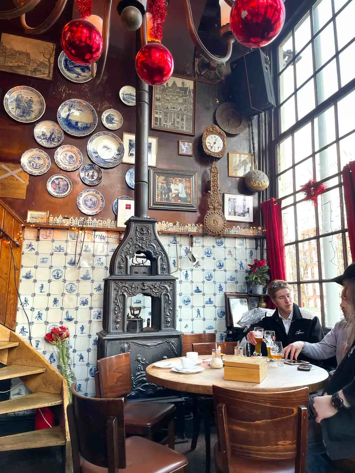 People sitting at a table in a cafe