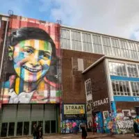 Exterior of the STRAAT Museum in Amsterdam with the Anne Frank mural 