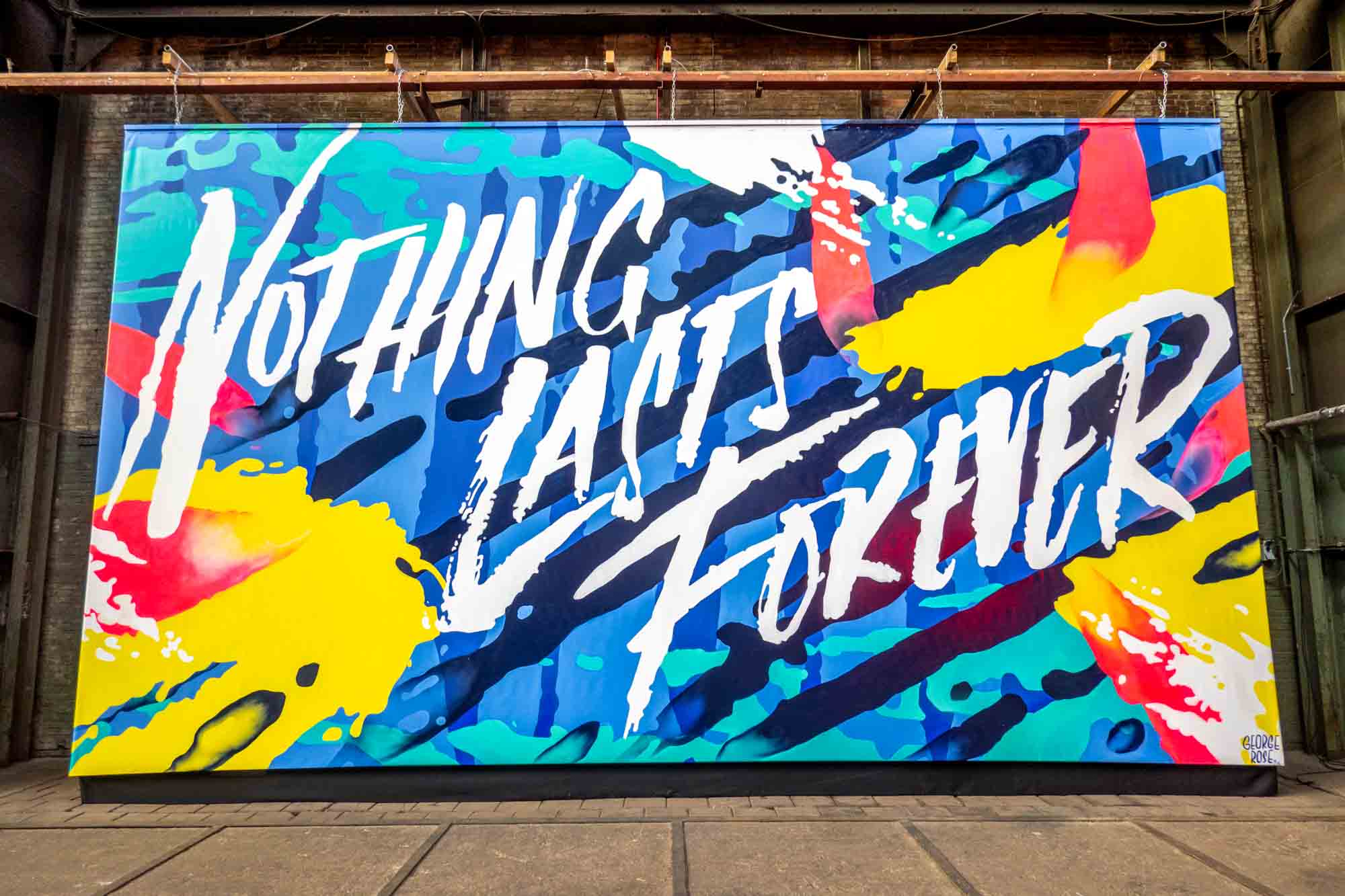 Colorful mural that says "Nothing Lasts Forever"