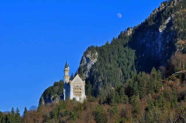 Neuschwanstein Castle and the Rising Moon