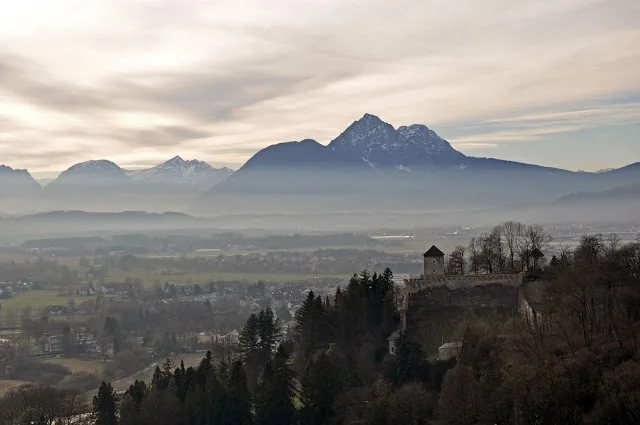 A hazy view of Salzburg and the mountains from the Hohensalzburg Fortress