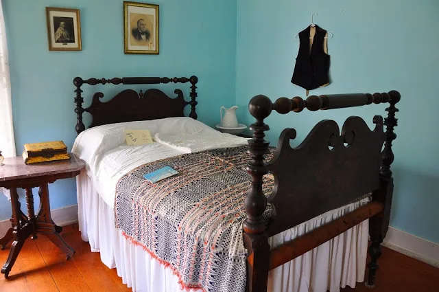 A bedroom in the LaPorte House in period decoration